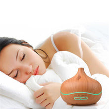 Load image into Gallery viewer, Sleeping with the 300 ml Light Wood Grain Ultrasonic Aroma Essential Oil Diffuser
